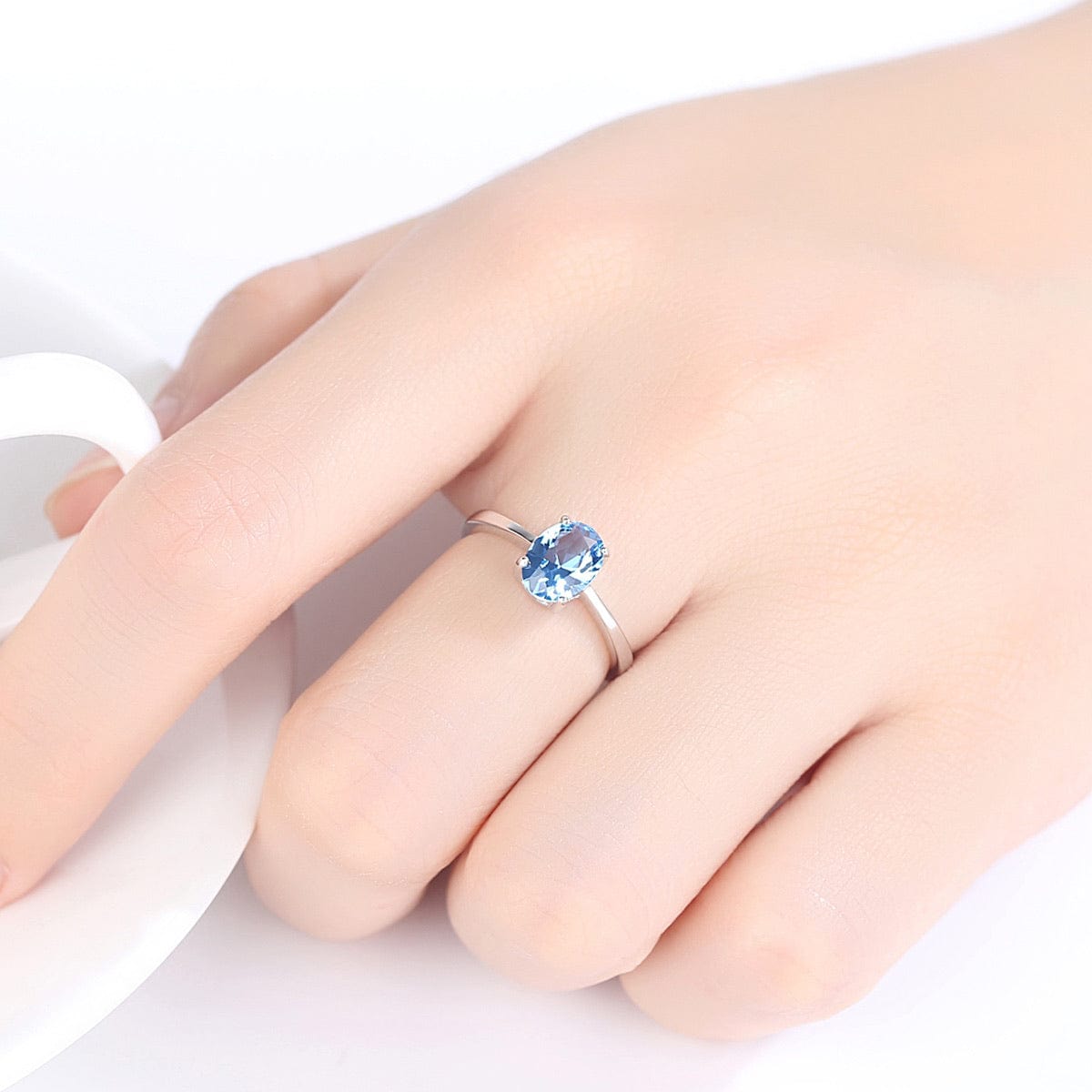 Bieauli Jewellery London Ring Silver & Topaz Engagement Ring, oval gemstone, sterling silver, November Birthstone